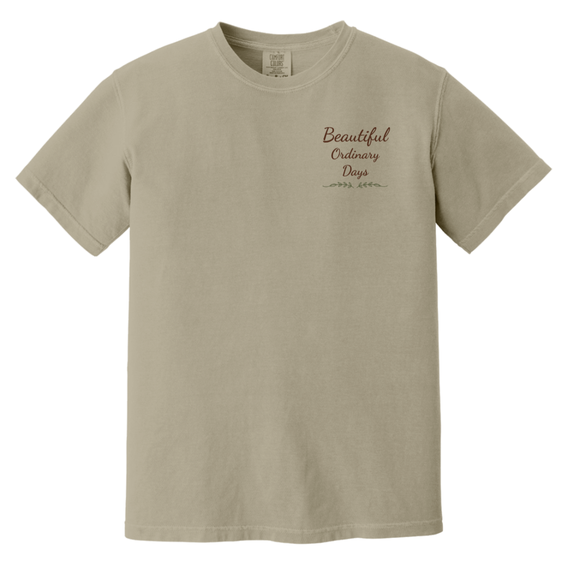 Beautiful Ordinary Days script logo chest design with decorative greenery on Comfort Colors t-shirt.