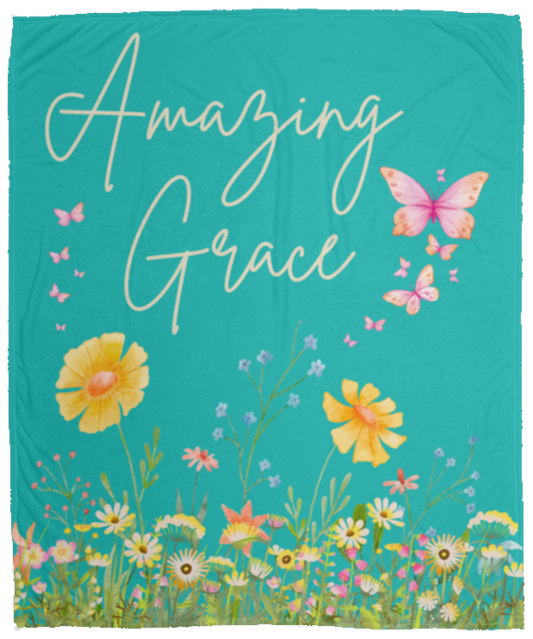 Amazing Grace inspirational plush fleece blanket with floral garden artwork, butterflies, teal background, and Christian faith-inspired message for cozy home decor.