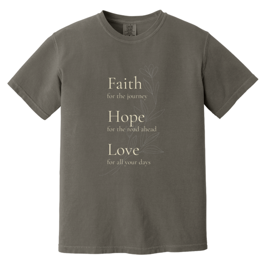 Faith Hope Love floral Comfort Colors t-shirt in Pepper featuring cream vintage-inspired typography and delicate floral artwork.