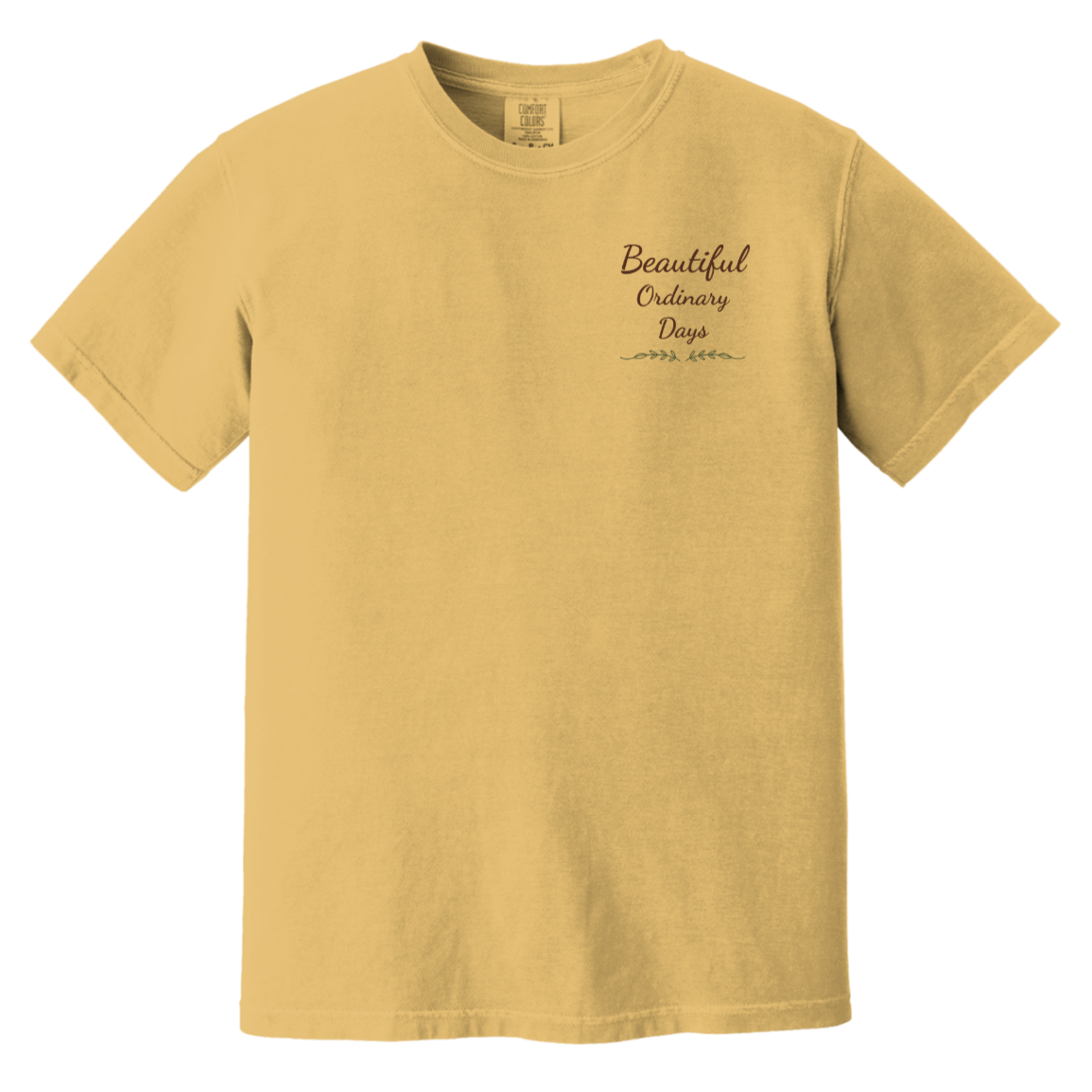 Beautiful Ordinary Days script logo chest design with decorative greenery on Comfort Colors t-shirt.
