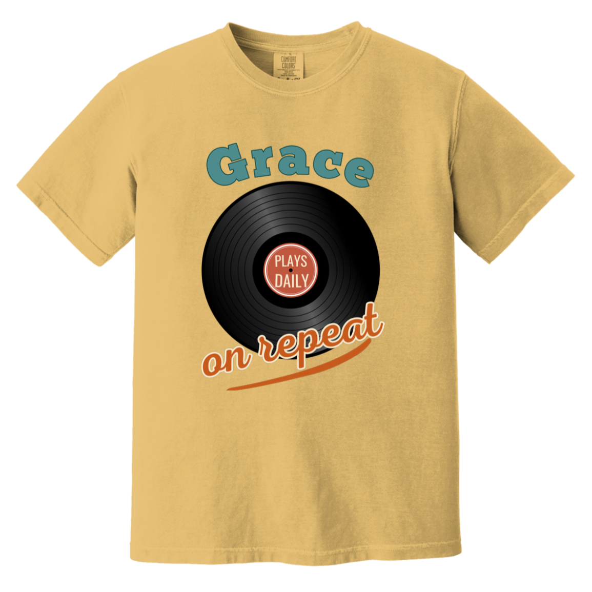 Mustard yellow retro-inspired Comfort Colors shirt featuring a vintage vinyl graphic and uplifting “Grace Plays Daily on Repeat” message.