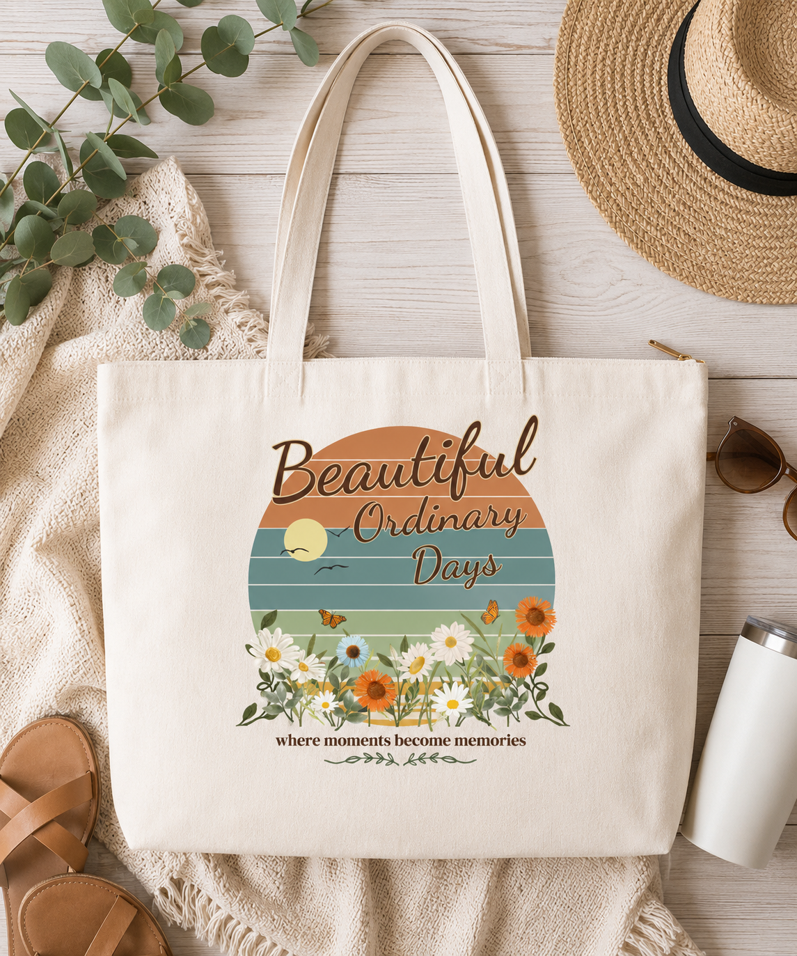 Comfort Colors ivory zip tote featuring the Beautiful Ordinary Days vintage floral design with retro sunset colors in a cozy flat lay setting.
