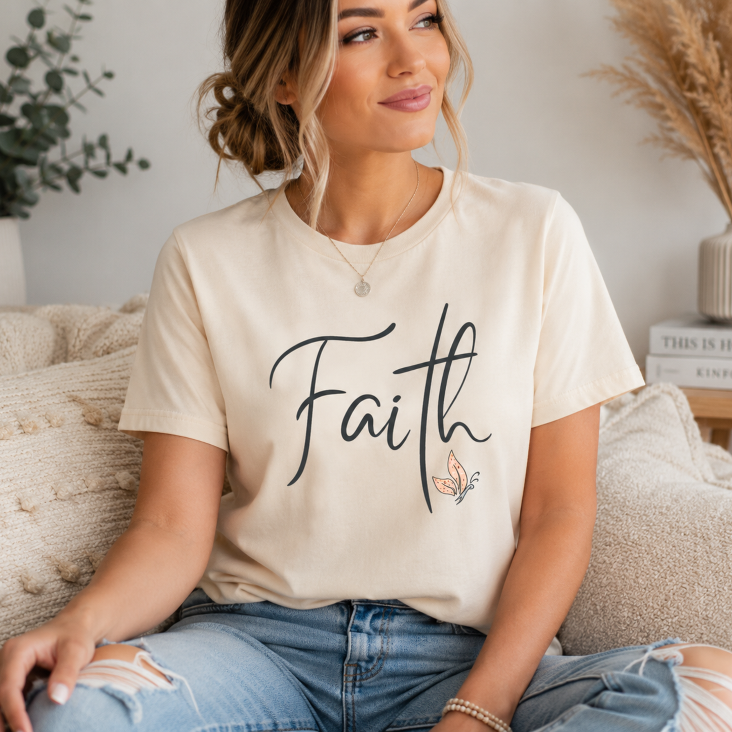 Lady in Minimalist Faith Christian t-shirt in script lettering on Bella Canvas unisex tee available in soft pastel colors.